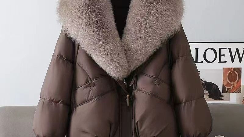 Woman wearing a tailored padded winter coat